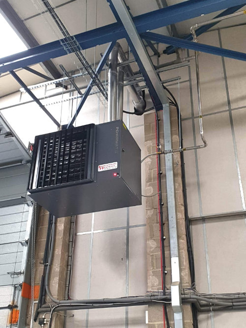 Industrial heaters installation of powrmatic LX70F 70.0kW gas fired suspended unit heaters Camberley Hampshire